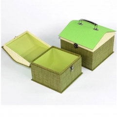 caja de regalo con forma de casa con mango