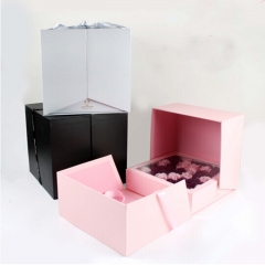 Caja de regalo de papel de flor de diseño creativo con cinta