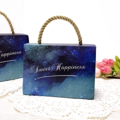 Caja de regalo de caramelo portátil estrellado personalizado con cuerda para ocasiones de boda